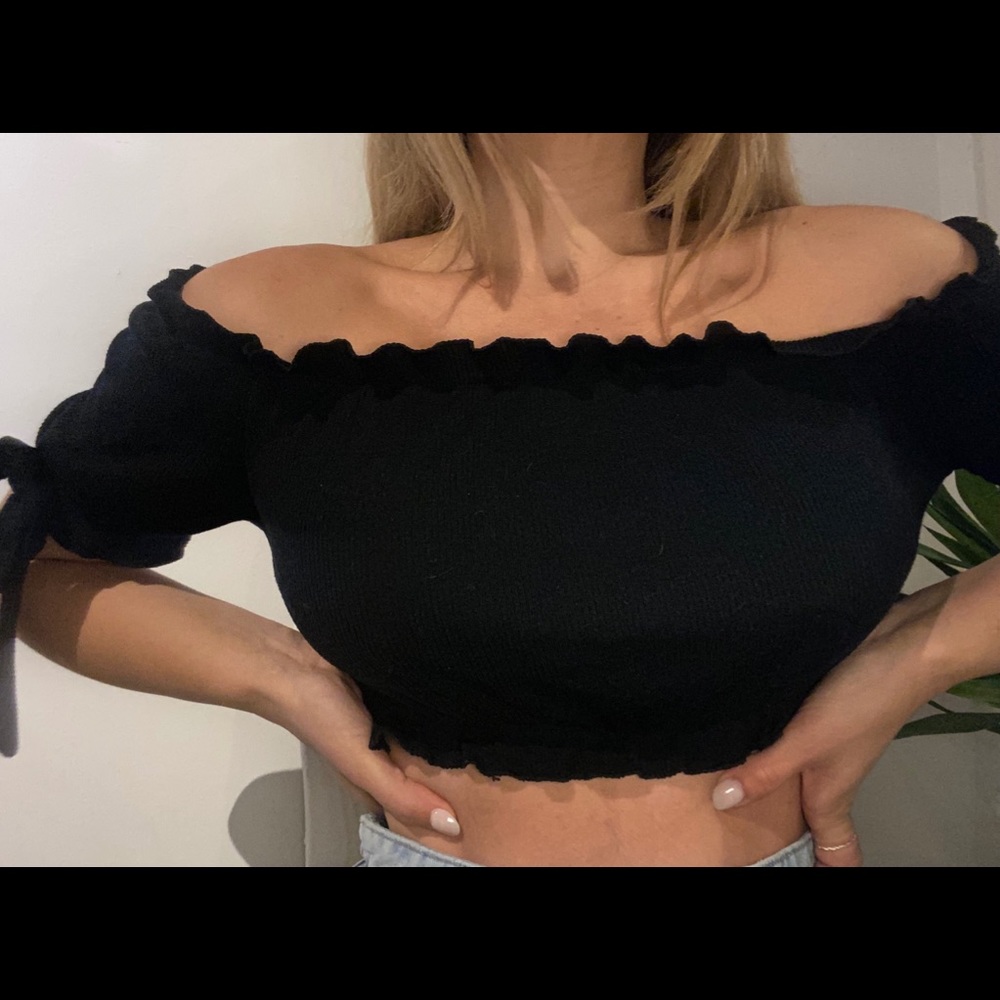 Black crop top with bow tie on the sides